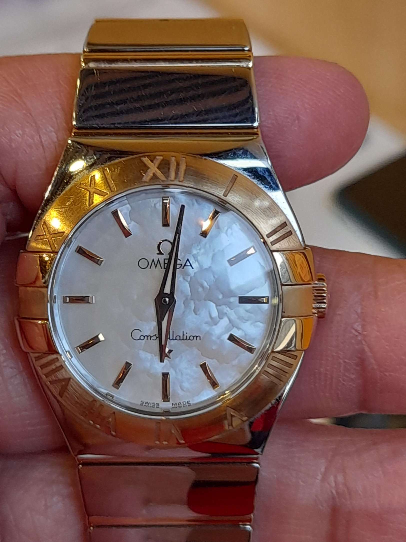 OMEGA