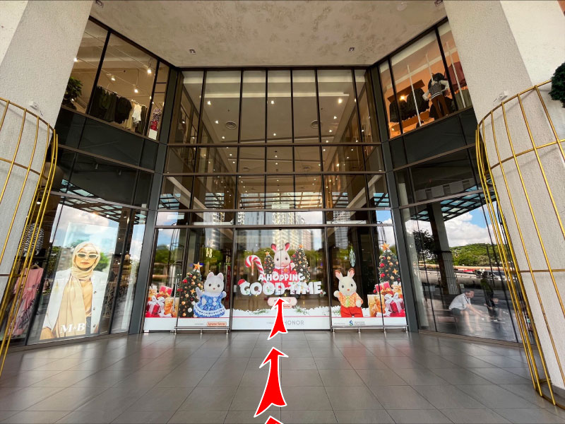 Paradigm Mall entrance with starbucks nearby